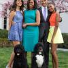 President Barack Obama, First Lady Michelle Obama, and daughters Malia and Sasha pose for a family portrait with Bo and Sunny in the Rose Garden of the White House on Easter Sunday, April 5, 2015.