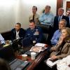 President Barack Obama and Vice President Joe Biden, along with members of the national security team, receive an update on the mission against Osama bin Laden in the Situation Room of the White House, May 1, 2011. Seated, from left, are: Brigadier Genera