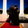 President Barack Obama and First Lady Michelle Obama wave goodbye to President Shimon Peres of Israel on the North Portico of the White House following the Presidential Medal of Freedom ceremony and dinner in his honor, June 13, 2012. 