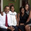 President Barack Obama, First Lady Michelle Obama, and their daughters, Sasha and Malia, sit for a family portrait in the Green Room of the White House, September 1, 2009. (Official White House Photo by Annie Leibovitz)