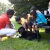 First Lady Michelle Obama and kids from Tubman Elementary School in Washington, D.C., pet Bo, the Obama family dog, on the South Lawn of the White House, September 14, 2011. 