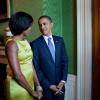 President Barack Obama and First Lady Michelle Obama wait in the Green Room before hosting a Diplomatic Corps Reception in the East Room of the White House, October 5, 2010.