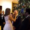 First Lady Michelle Obama greets Sting while President Barack Obama greets other honorees Tom Hanks, Lily Tomlin, and Patricia McBride in the Blue Room during the Kennedy Center Honors reception at the White House, December 7, 2014. Honoree Al Green stand