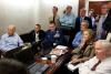 President Barack Obama and Vice President Joe Biden, along with members of the national security team, receive an update on the mission against Osama bin Laden in the Situation Room of the White House, May 1, 2011. Seated, from left, are: Brigadier Genera